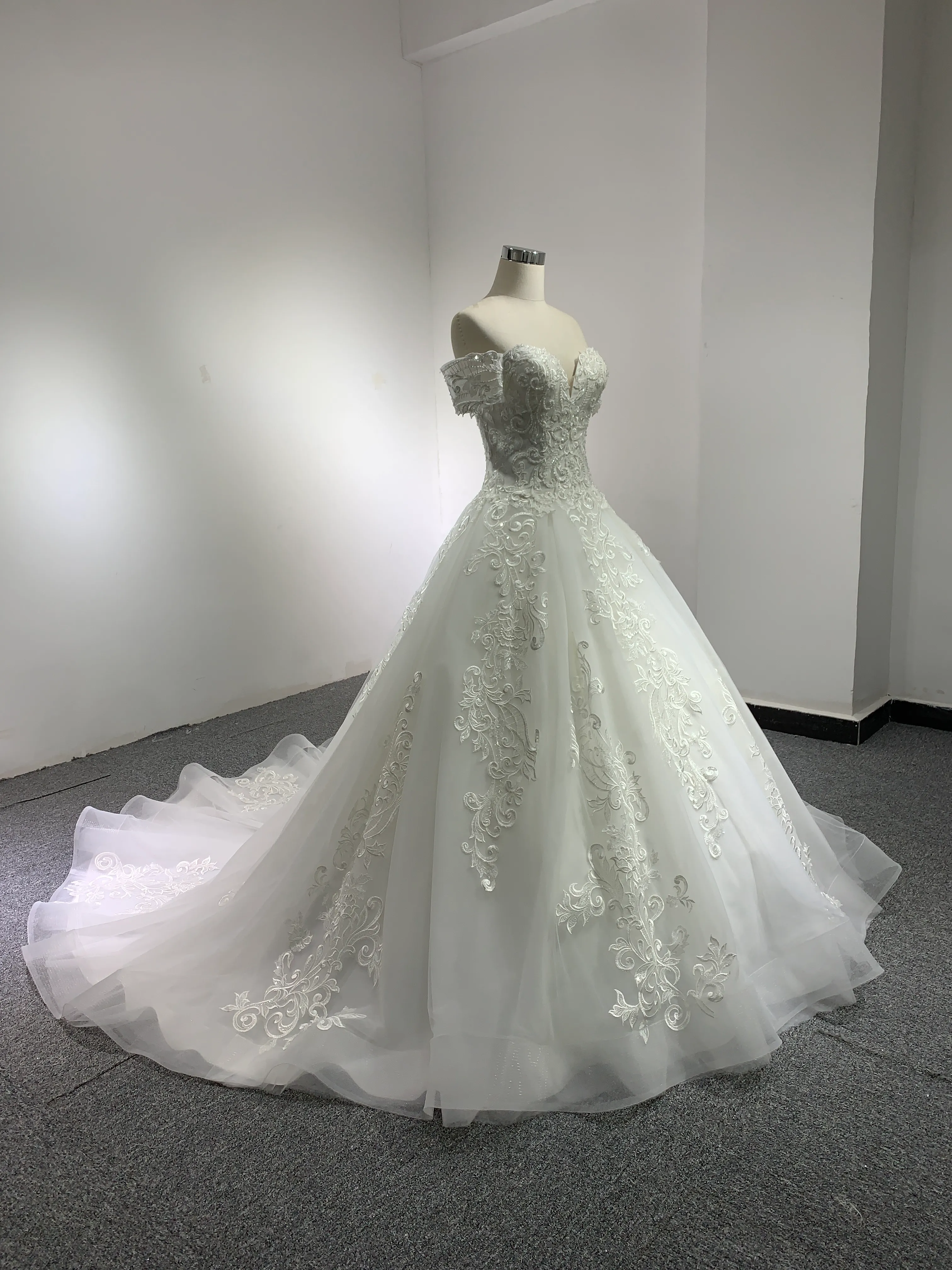 BYG chapel train off the shoulder lace wedding gown