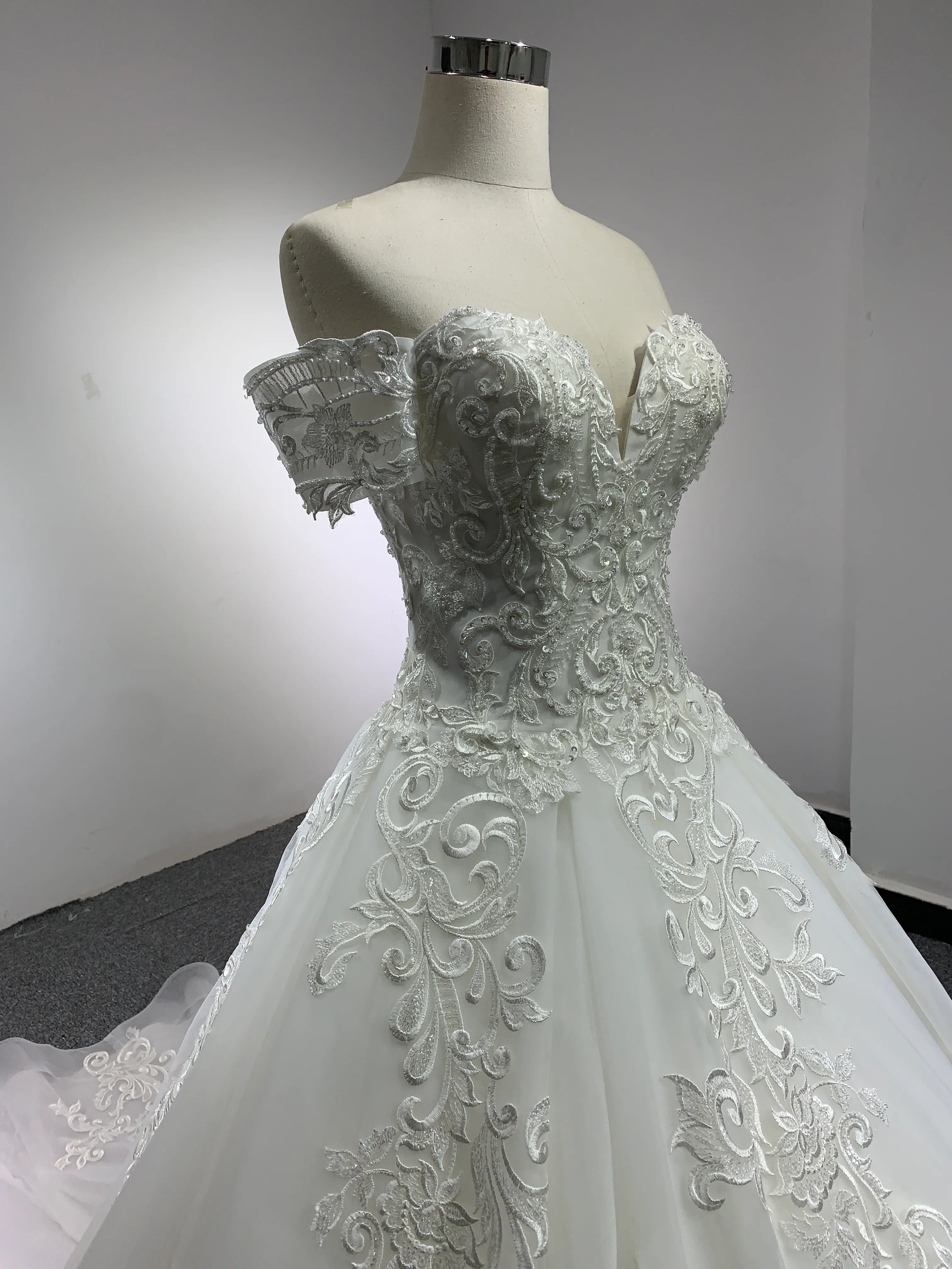 BYG chapel train off the shoulder lace wedding gown