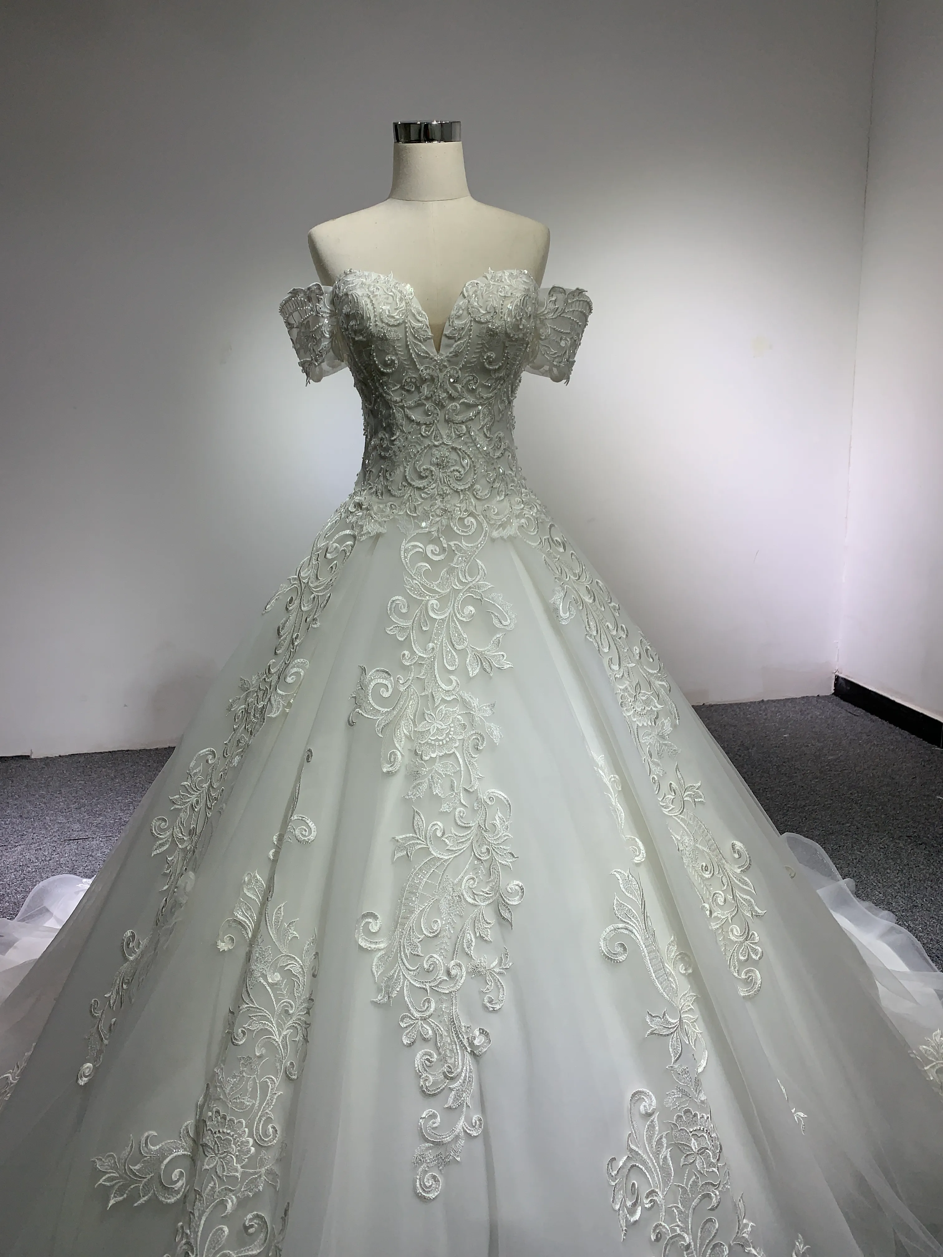 BYG chapel train off the shoulder lace wedding gown