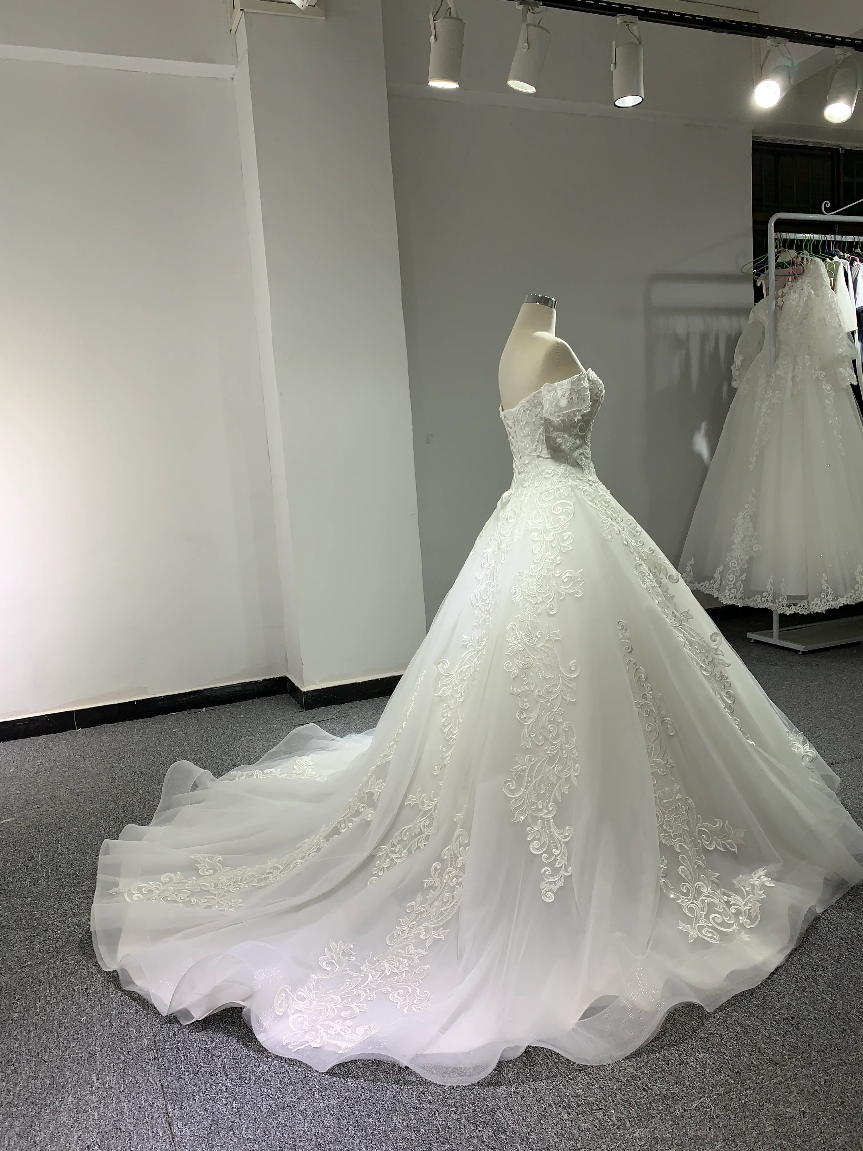 BYG chapel train off the shoulder lace wedding gown