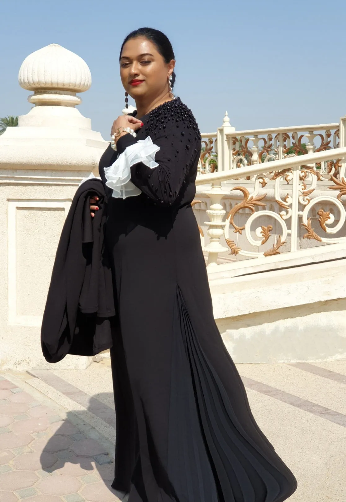 Gabrielle • Black Gown with Sleeves pearls and side pleated insert