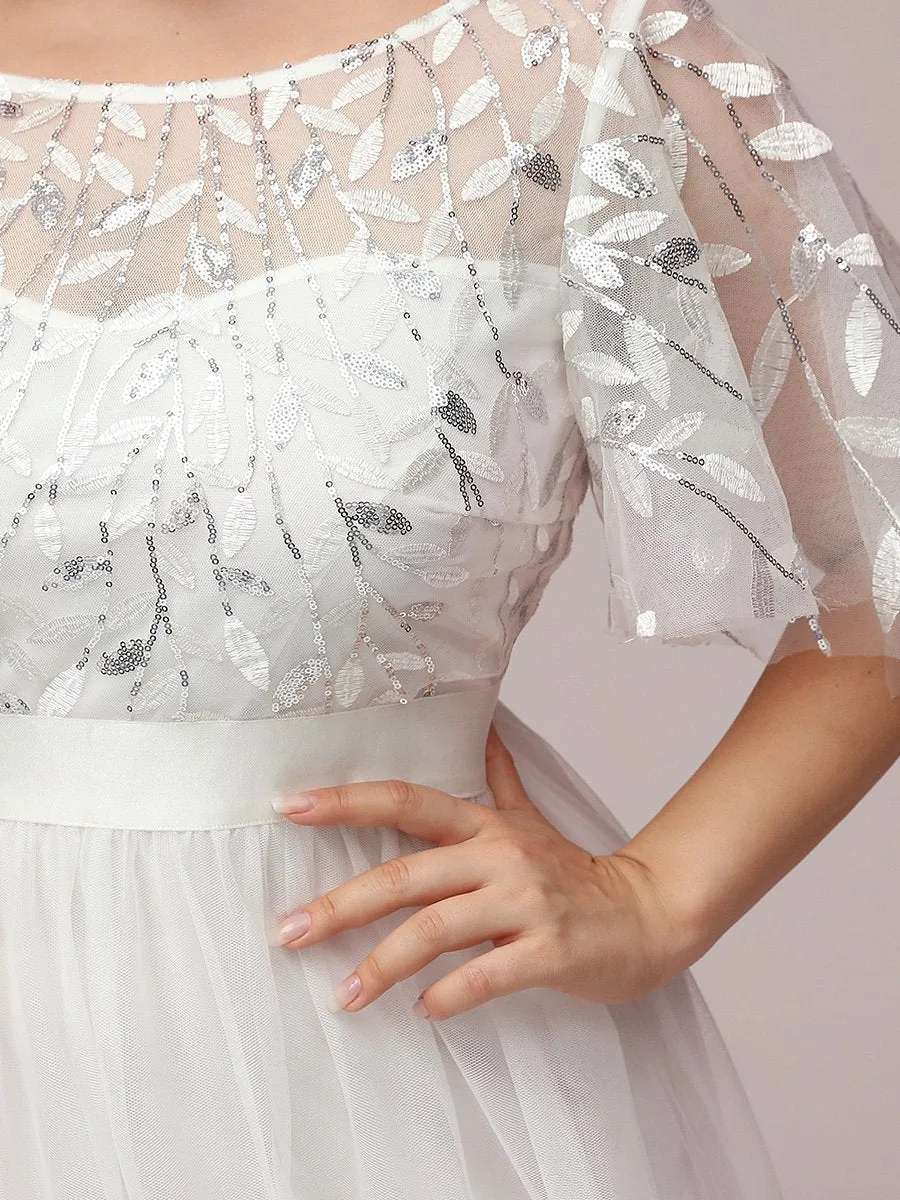 Jen flutter sleeve tulle wedding dress in Ivory Express NZ wide