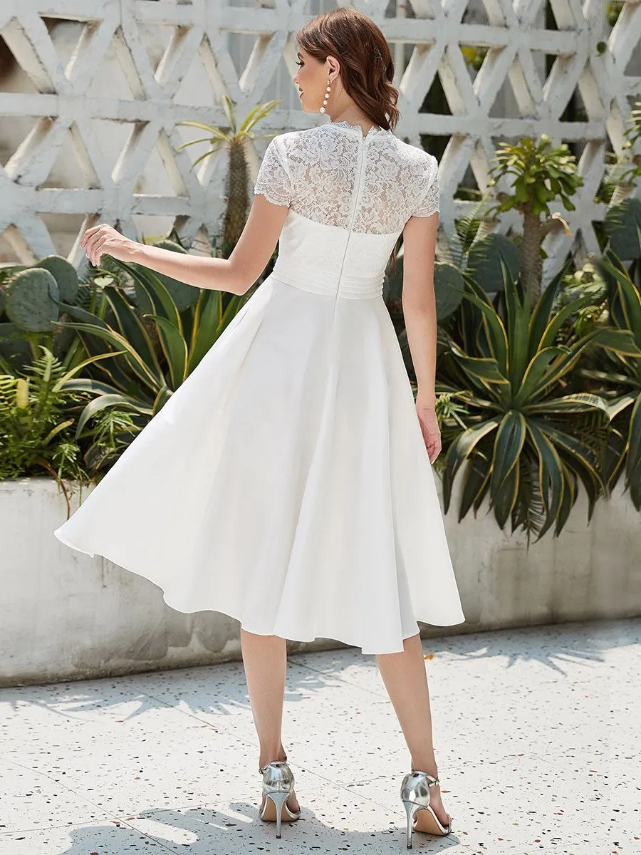 June Ivory satin and lace below knee wedding dress Express NZ wide