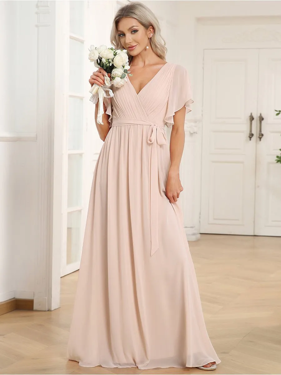 Reena Blush chiffon wedding dress with sleeve and waist tie s16 Express NZ Wide