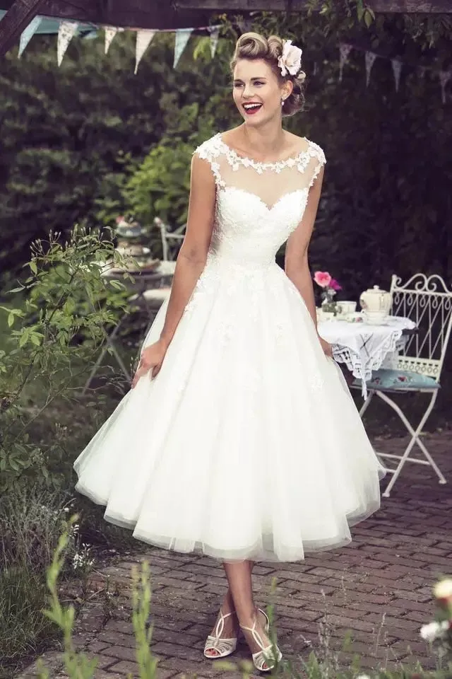 The Sales Rack-Vintage Ivory Lace Brides Dress Sexy Sheer Neck Cap Sleeves Tea Length Custom Made