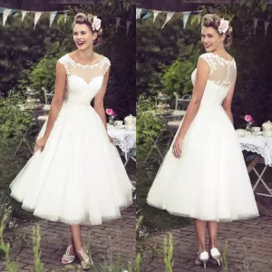 The Sales Rack-Vintage Ivory Lace Brides Dress Sexy Sheer Neck Cap Sleeves Tea Length Custom Made